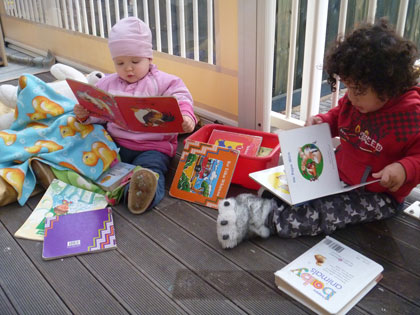 Alexandria and Tukino share some books